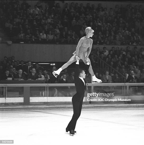 Ludmila Belousova being lifted by Oleg Protopopov both of the Soviet Union during their routine in the Pairs Figure Skating event at the 1968 Winter...