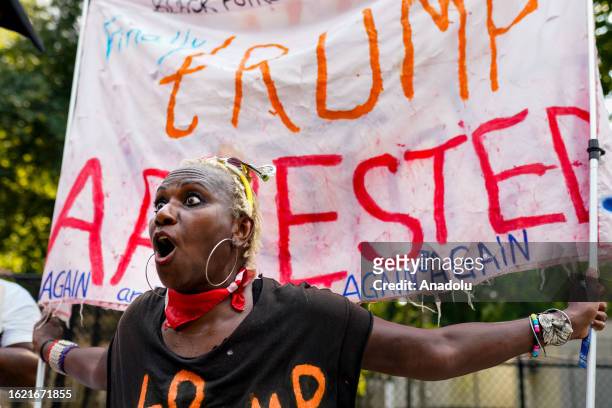 Anti-Trump protesters gather to demonstrate before the former president Donald Trump arrives in Atlanta, Georgia, United States on August 24, 2023.