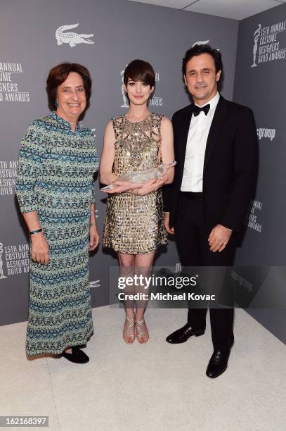 Beryl Lacoste-Hamilton, Spotlight Award recipient Anne Hathaway and Lacoste CEO Francis Pierrel attend the 15th Annual Costume Designers Guild Awards...