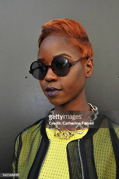 Stylist and Blogger Olivia Akot wears an organza style bomber jacket, with neon yellow top from Topshop,accessorised with Go Go Philips necklace,...