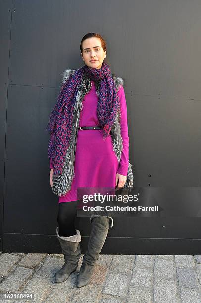 Natalia Dombrovska wears a silver fox fur gilet, a Louis Vuitton scarf, and Diane von Furstenberg dress accessorised by a Forever 21 belt, Wolford...