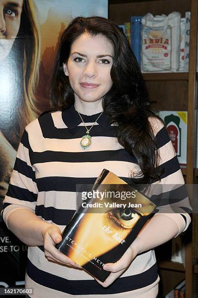 Author Stephenie Meyer greets fans and signs copies of her book "The Host" at Books and Books on February 19, 2013 in Coral Gables, Florida.