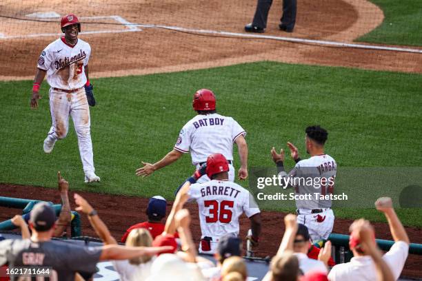 Jeter Downs of the Washington Nationals celebrates after scoring a run against the Boston Red Sox during the fifth inning at Nationals Park on August...