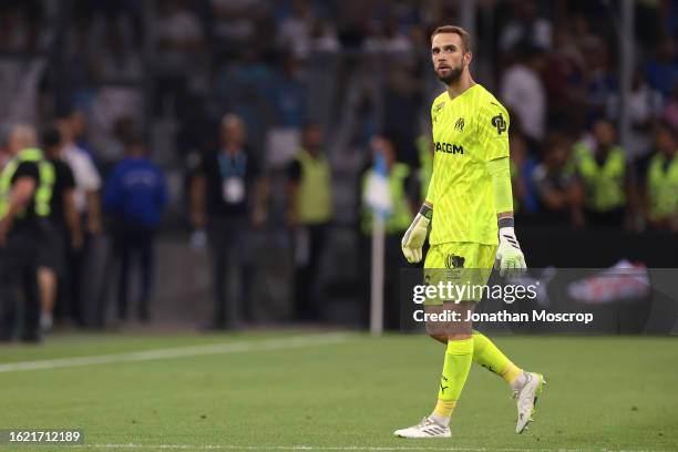 Pau Lopez of Olympique De Marseille reacts as he leaves the field of play to be substituted for team mate Ruben-Santiago Blanco Veiga for the penalty...