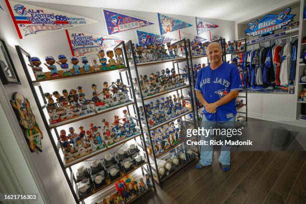 Lorne Rosen in his suburban home where a room is dedicated to his memorabilia - with includes over 250 Toronto Blue Jay themed bobbleheads. PD...