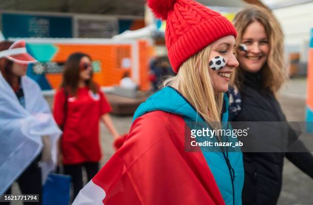 friends with football face paint enjoying outdoors. - new zealand stadium stock pictures, royalty-free photos & images