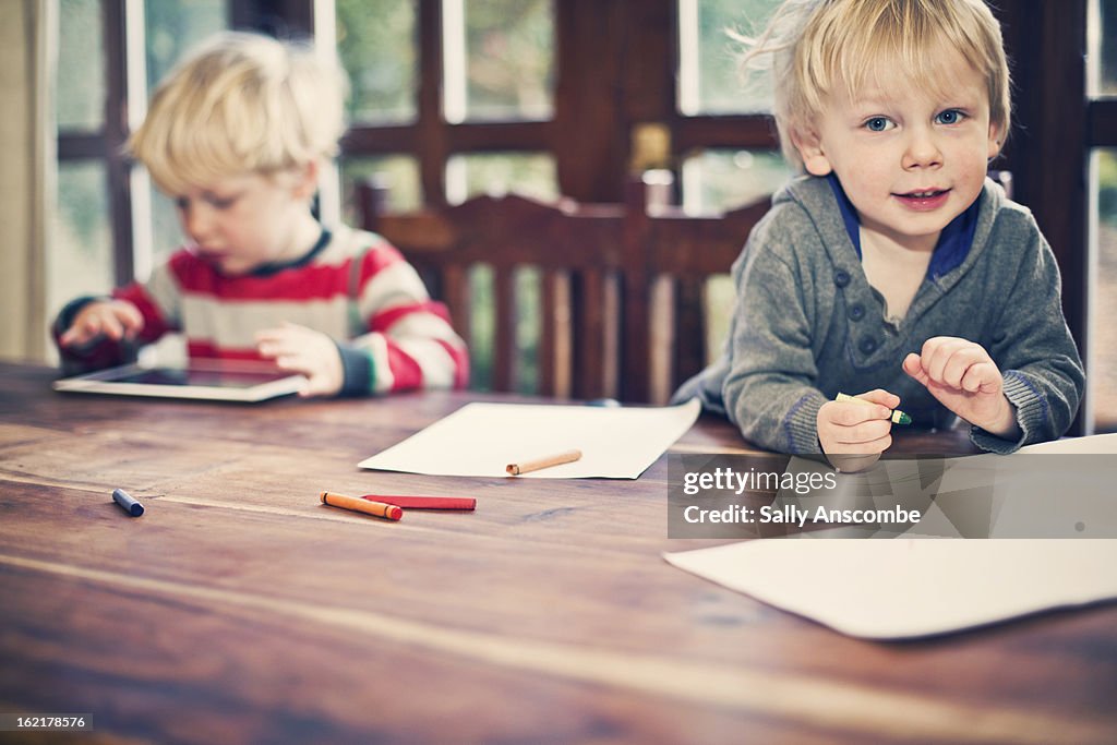 Children drawing pictures.