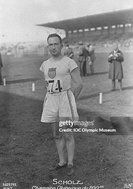 Jackson Scholz of the USA rests between events during the 1924 Olympic Games in Paris. Scholz won the gold medal in the 200 metres event and the...