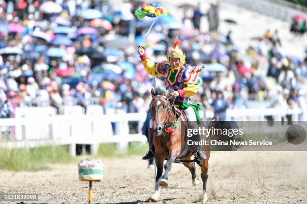 Rider demonstrates his equestrian skills during the traditional Shoton Festival on August 17, 2023 in Lhasa, Tibet Autonomous Region of China.