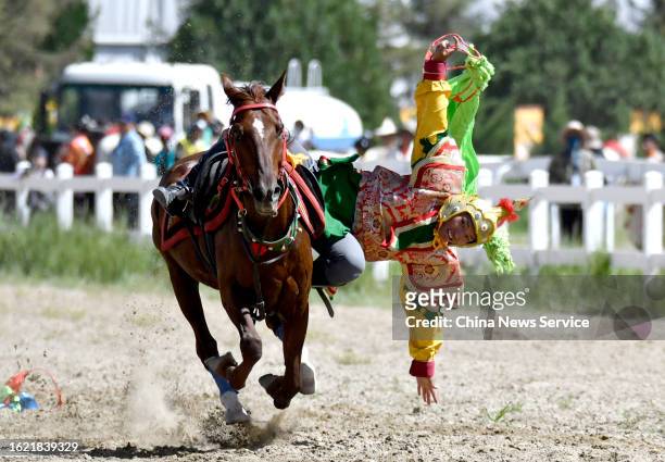 Rider demonstrates his equestrian skills during the traditional Shoton Festival on August 17, 2023 in Lhasa, Tibet Autonomous Region of China.