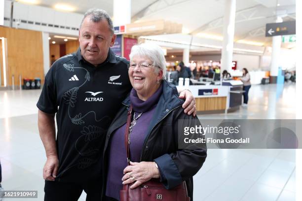 All Blacks coach Ian Foster poses with fan Lorraine McRae as the All Blacks depart for the Rugby World Cup at Auckland International Airport on...