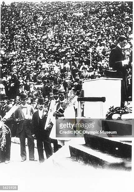 Spiridon Louis of Greece receives his medal at the medal ceremony for winning the Marathon event during the 1896 Olympic Games in Athens, Greece. \...
