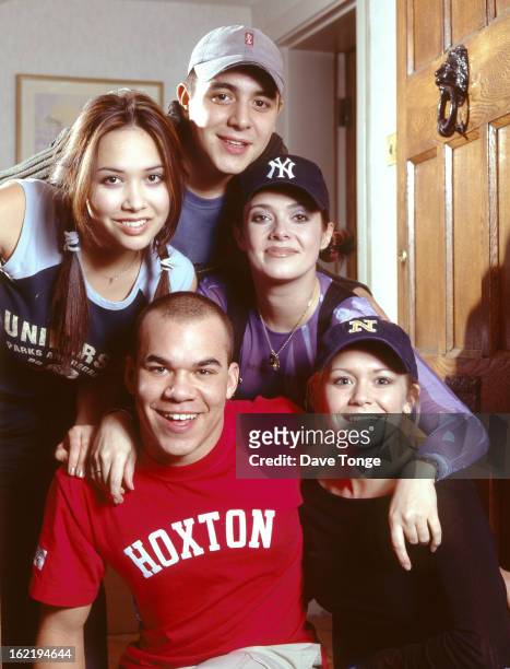 British reality TV pop group Hear'Say pose for a group portrait in London, February 2001. Clockwise from bottom left: Danny Foster, Myleene Klass,...