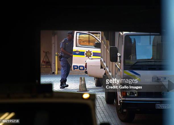 Oscar Pistorius is transported to the Pretoria Magistrate Court on February 20, 2013 for the second day of his bail hearing in Pretoria, South...
