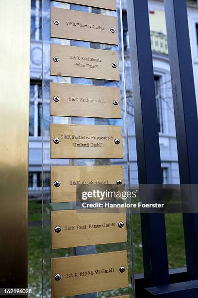 Nameplate at the headquarters of the S&K investment group is displayed the day after police raided the company's offices on February 20, 2013 in...