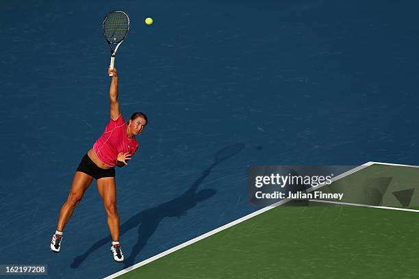 Yulia Putintseva of Kazakhstan serves to Agnieszka Radwanska of Poland during day three of the WTA Dubai Duty Free Tennis Championship on February...