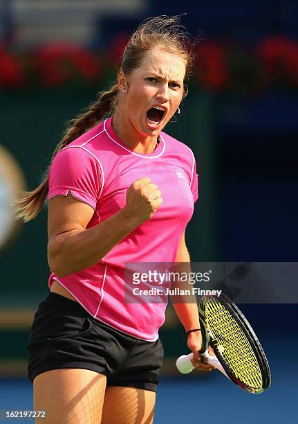 Yulia Putintseva of Kazakhstan celebrates winning a point against Agnieszka Radwanska of Poland during day three of the WTA Dubai Duty Free Tennis...