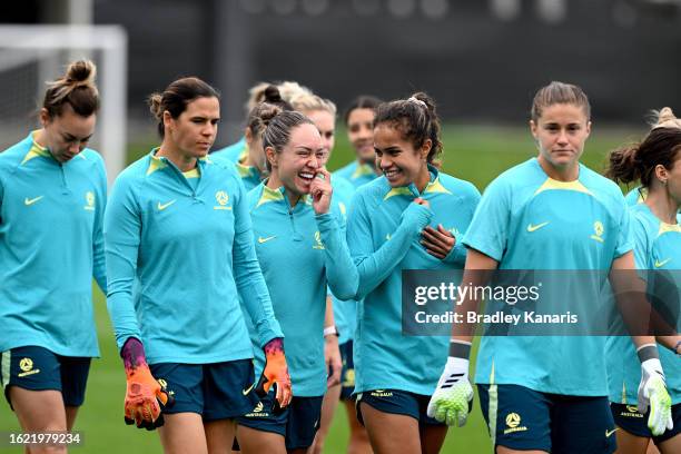 Mary Fowler and Kyah Simon share a laugh during an Australia Matildas training session during the FIFA Women's World Cup Australia & New Zealand 2023...