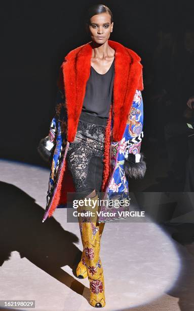 Model walks the runway at the Tom Ford Ready to Wear Fall/Winter 2013-2014 show during London Fashion Week Fall/Winter 2013/14 at on February 18,...