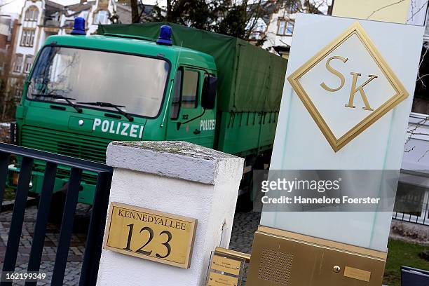 Police car stands outside the headquarters of the S&K investment group the day after police raided the company's offices on February 20, 2013 in...