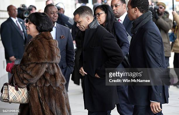 Former Rep. Jesse Jackson Jr., surrounded by family and friends, enters U.S. District Court February 20, 2013 in Washington, DC. Jackson and his...