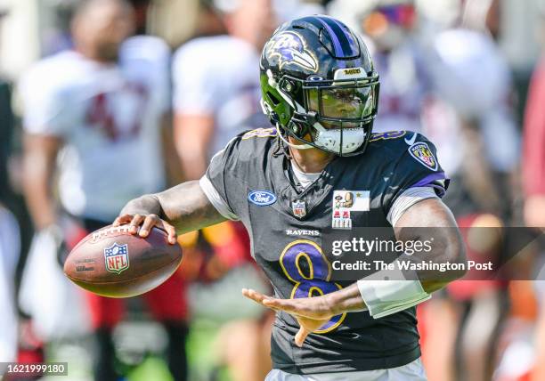 Baltimore Ravens quarterback Lamar Jackson throws during a joint practice with the Washington Commanders at the Ravens training facility on August...