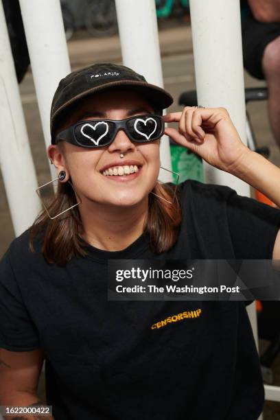 June 16: Jechu Corvalán Yañez, from Chile, shows off her hand-drawn heart-shaped glasses.