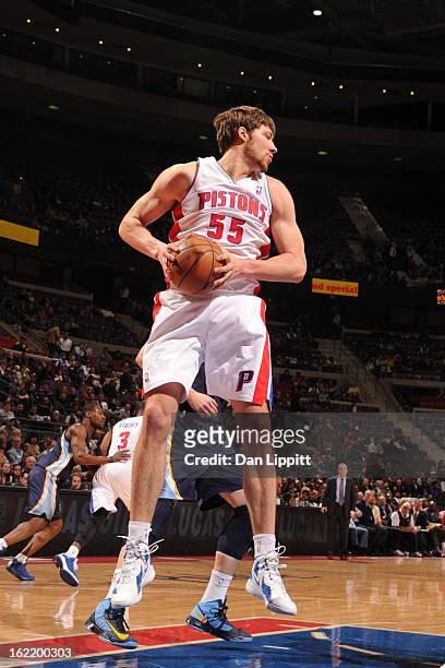 Viacheslav Kravtsov of the Detroit Pistons grabs the rebound against the Memphis Grizzlies on February 19, 2013 at The Palace of Auburn Hills in...