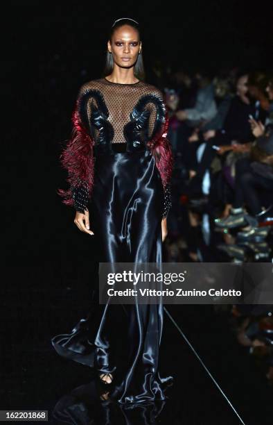 Joan Smalls walks the runway at the Gucci fashion show as part of Milan Fashion Week Womenswear Fall/Winter 2013/14 on February 20, 2013 in Milan,...