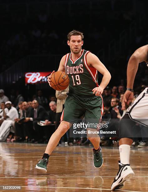 Beno Udrih of the Milwaukee Bucks dribbles the ball against the Brooklyn Nets at the Barclays Center on February 19, 2013 in New York City. NOTE TO...