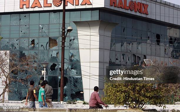 Window glass of factory broken by mob during 48 hours nationwide strike called by eleven major Trade Unions to protest Government’s economic and...