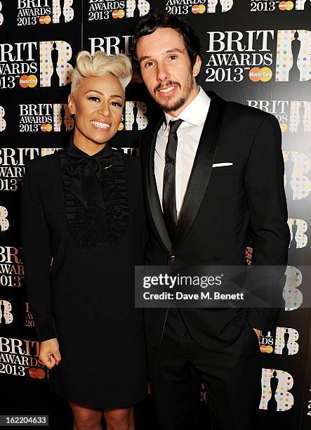 Emeli Sande and Adam Gouraguine arrive at the BRIT Awards 2013 at the O2 Arena on February 20, 2013 in London, England.