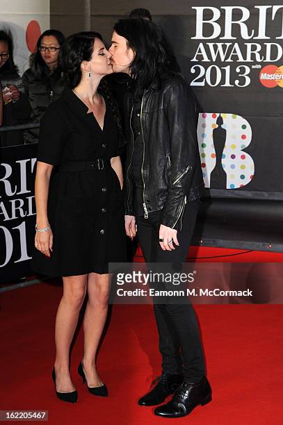 Lana Del Rey and boyfriend Barrie James O'Neil kiss on the red carpet at the Brit Awards 2013 at the 02 Arena on February 20, 2013 in London, England.