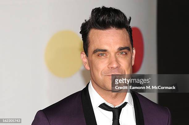 Robbie Williams attends the Brit Awards 2013 at the 02 Arena on February 20, 2013 in London, England.