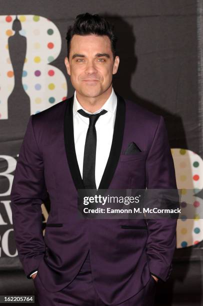 Robbie Williams attends the Brit Awards 2013 at the 02 Arena on February 20, 2013 in London, England.