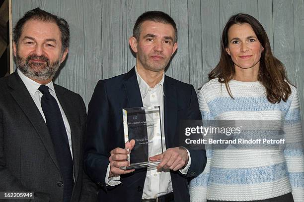 Denis Olivennes, President of Lagardere Active, Philippe Lancon, prize laureate, and Aurelie Filipetti, French Culture Minister, attend the prize...