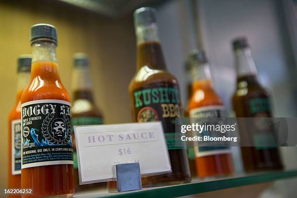 Various sauces made with medical marijuana sit on display at Palliative Health Center in San Jose, California, U.S., on Thursday, Feb. 7, 2013. The...