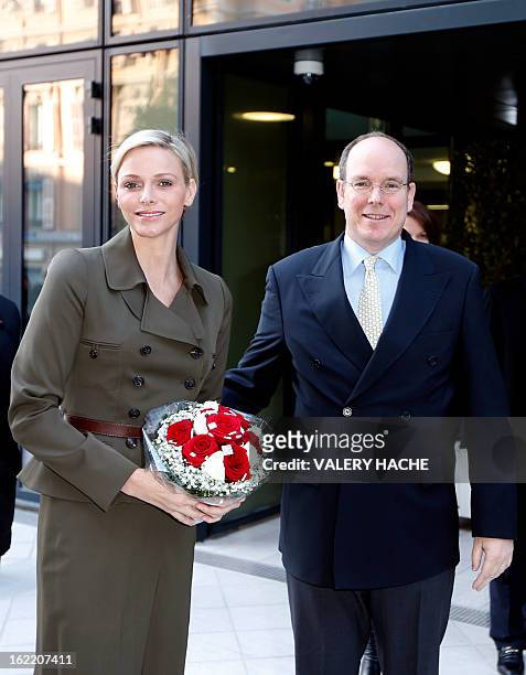 Princess Charlene and Prince Albert II of Monaco visit the new "Lycee Technique et Hotelier de Monaco" on February 20, 2013 in Monaco. AFP PHOTO /...