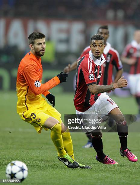 Gerard Pique of FC Barcelona compete for the ball with Kevin Prince Boateng of AC Milan compete for the ball during the UEFA Champions League Round...