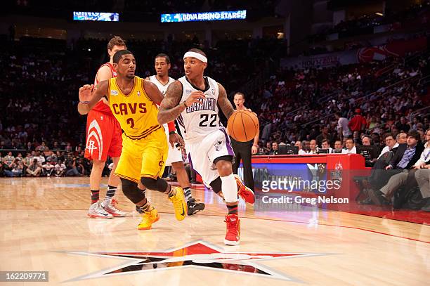 Rising Stars Challenge: Sacramento Kings Isaiah Thomas in action vs Clevaland Cavaliers Kyrie Irving during All-Star Weekend at Toyota Center....