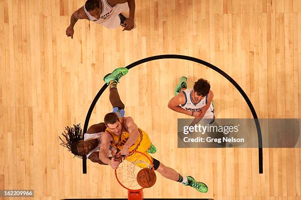 Rising Stars Challenge: Aerial view of Cleveland Cavaliers Tyler Zeller in action vs Denver Nuggets Kenneth Faried during All-Star Weekend at Toyota...