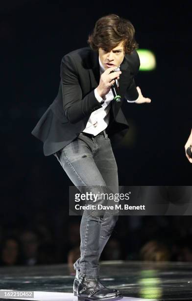 Harry Styles of One Direction performs on stage at the Brit Awards at 02 Arena on February 20, 2013 in London, England.