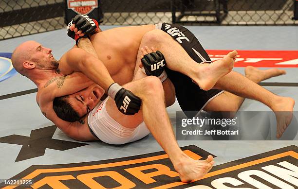 Robert "Bubba" McDaniel and Kelvin Gastelum grapple in their preliminary fight during filming for season seventeen of The Ultimate Fighter at the UFC...