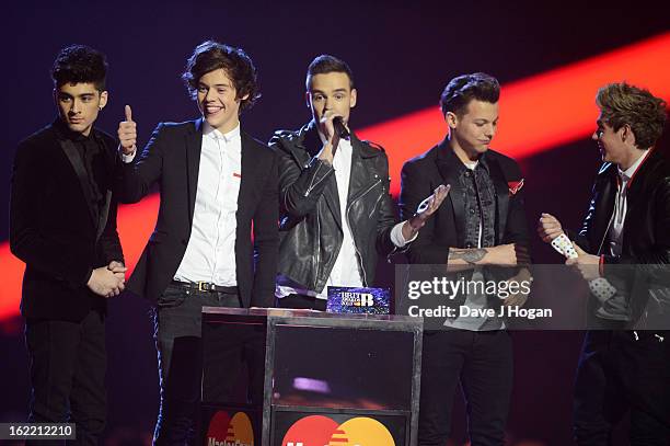 Liam Payne, Louis Tomlinson, Zayn Malik, Harry Styles and Niall Horan of One Direction accept their Global Success Award at The Brit Awards 2013 at...