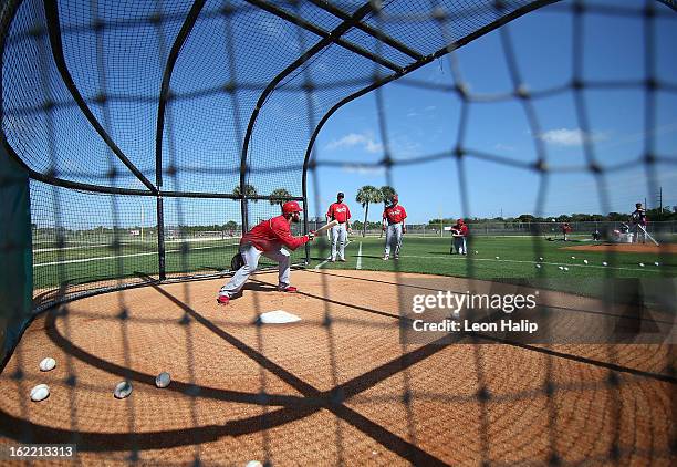 Mitchell Boggs of the St. Louis Cardinals goes through the bunting drills during spring training on February 20, 2013 in Jupiter, Florida.