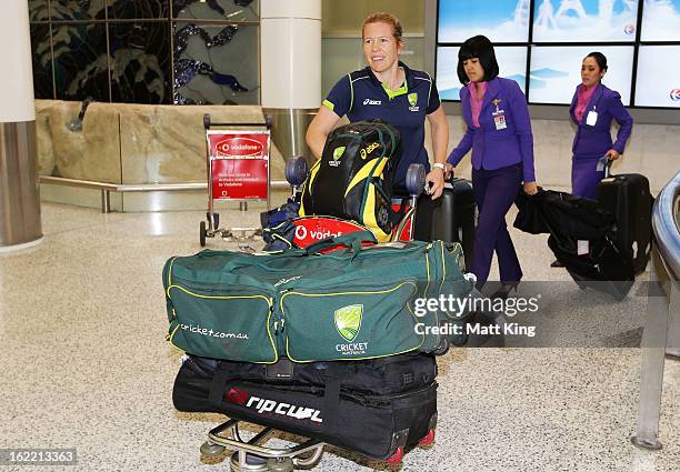 Alex Blackwell of the Australian women's cricket team arrives home following their win in the 2013 World Cup at Sydney International Airport on...