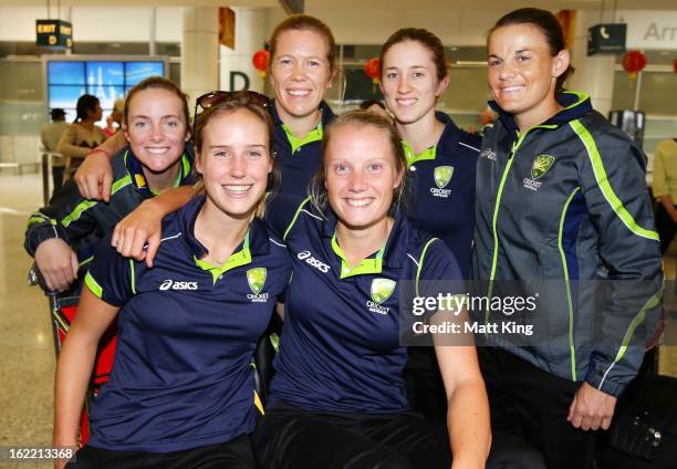 Sarah Coyte, Ellyse Perry, Alex Blackwell, Alyssa Healy, Rachael Haynes and Erin Osborne of the Australian women's cricket team pose after arriving...