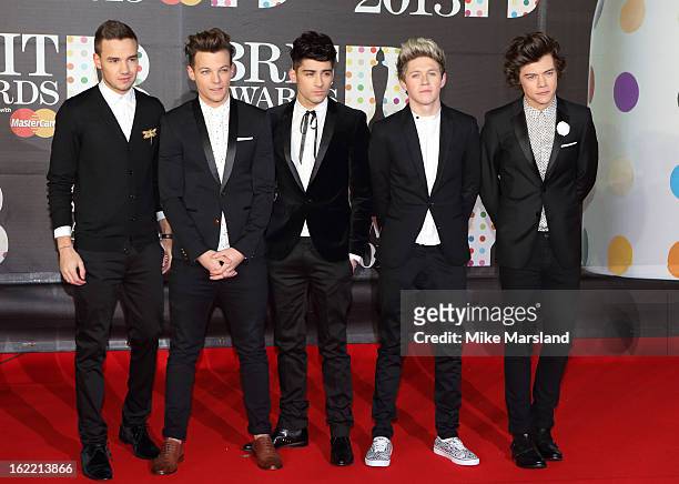 Liam Payne, Louis Tomlinson, Zayn Malik, Niall Horan and Harry Styles of One Direction attend the Brit Awards at 02 Arena on February 20, 2013 in...
