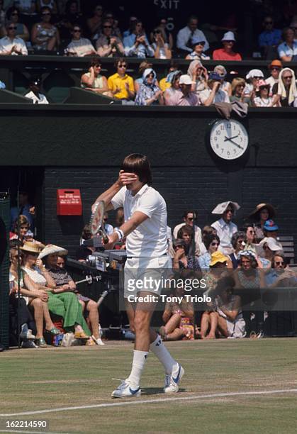 View of USA Jimmy Connors upset during Men's 1st round match vs Great Britain John Lloyd at All England Club. London, England 6/29/1975 CREDIT: Tony...