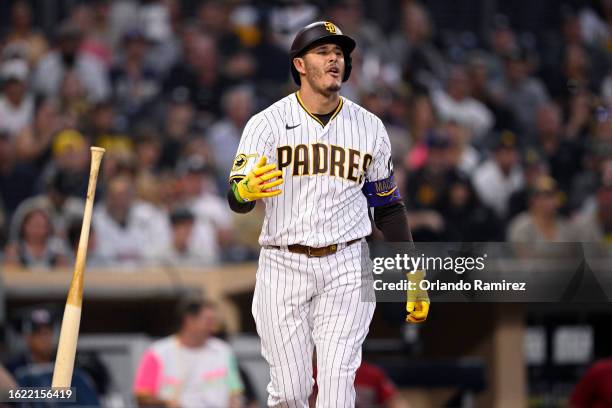 Manny Machado of the San Diego Padres reacts after striking out during the fifth inning against the Arizona Diamondbacks at PETCO Park on August 17,...